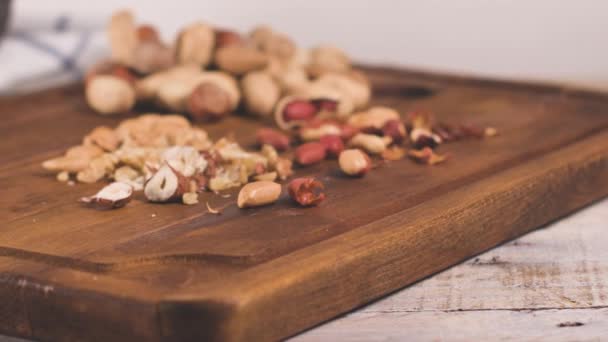 Walnuts Hazelnuts Peanuts Nuts Wooden Table — Stock Video