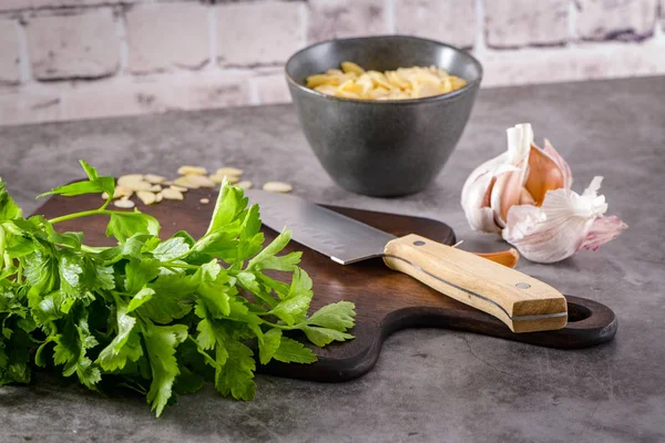 Fresh Garden Herbs Kitchen Countertop Parsley Garlic Knife Almons Concept — Stock Photo, Image