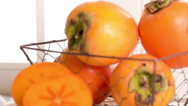 Delicious Fresh Persimmon Fruit Kitchen Countertop — Stock Video
