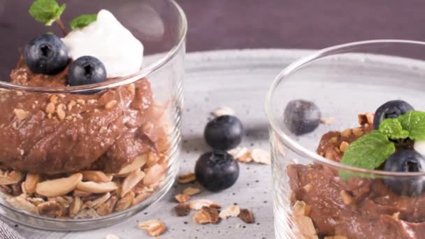 Glass Cups Chocolate Chestnuts Mousse Roasted Almonds Oats Decorated Black — Stock Video