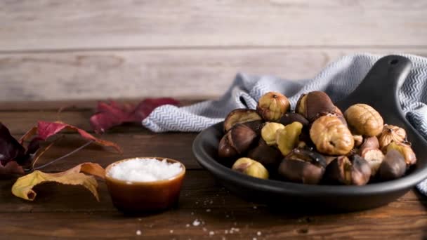 Roasted Chestnuts Cast Iron Pan Rustic Wooden Board Grey Wooden — Stock Video