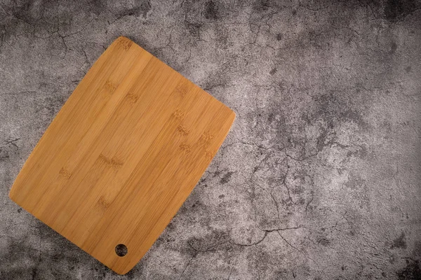 Top View Wooden Cutting Board Old Stone Countertop — Stock Photo, Image