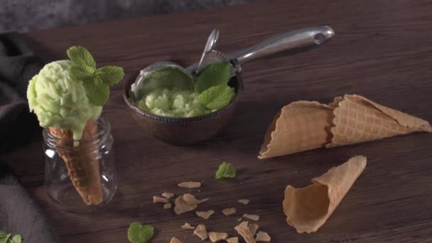 Pistachio Ice Cream Dark Rustic Bowl Waffle Cone Brown Wooden — Stock Video