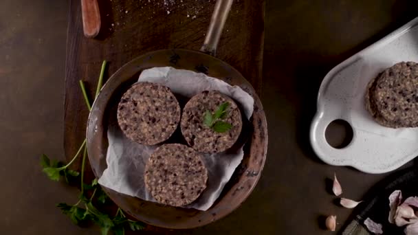 Raw Veggie Burger Black Beans Parsley Leaves Wood Countertop — Stock Video