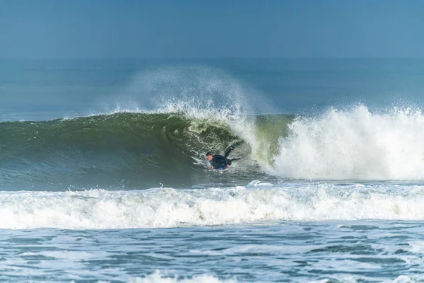 Bodyboarder surfing ocean wave — Stock Photo, Image