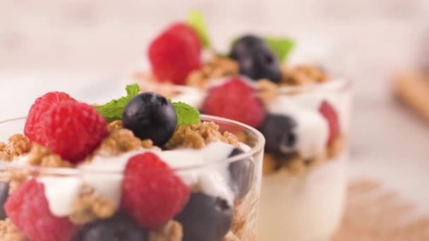 Granola Blackberries Raspberries Homemade Yogurt Glass Light White Wooden Background — Stock Video