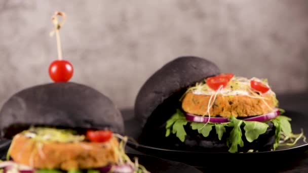 Tasty Grilled Veggie Burgers Chickpeas Vegetables Black Bread Dark Wooden — Stock Video