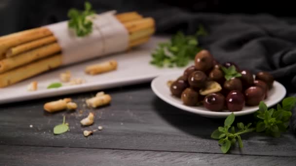 Fresh Baked Homemade Grissini Bread Sticks White Ceramic Tray Olive — Stock Video