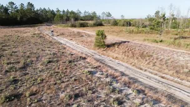 Aerial Drone Shot View One Enduro Motorcycle Drive Path Sandy — Stock Video