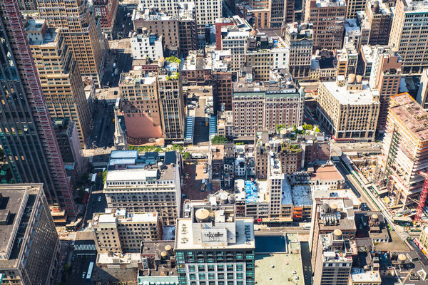 New York City Manhattan cityscape of buildings at midtown on sunny day
