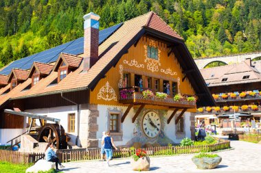  BREITNAU, GERMANY - SEPTEMBER 8, 2018:  View of Black Forest Cuckoo Clock village and shop on a sunny day. clipart