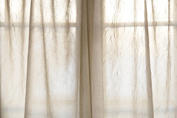 Sheer fabric window curtain with filtered light