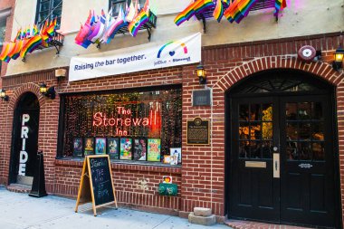 NEW YORK CITY - AUGUST 24, 2019:  Historic Stonewall Inn gay bar in Greenwich Village Lower Manhattan clipart