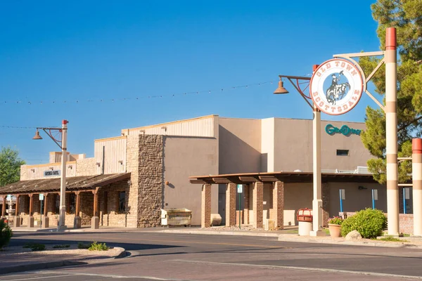 Scottsdale, Arizona - June 27, 2025: Street scene from historic American southwestern city of Old Scottsdale Arizona on a sunny day.