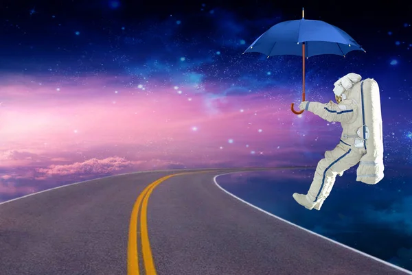 Spaceman Lands Umbrella Space Route Elements Image Furnished Nasa — стоковое фото