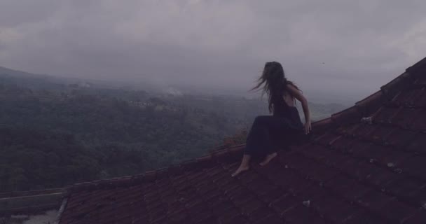 Beautiful Woman Sitting Red House Rooftop Aerial Drone View Beautiful — Stock Video