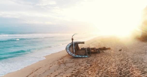 Aerial Drone View Beautiful Girl Colored Smoke Standing Shipwreck Beach — Stock Video