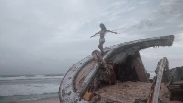 Aerial Drone View Beautiful Girl Colored Smoke Standing Shipwreck Beach — Stock Video
