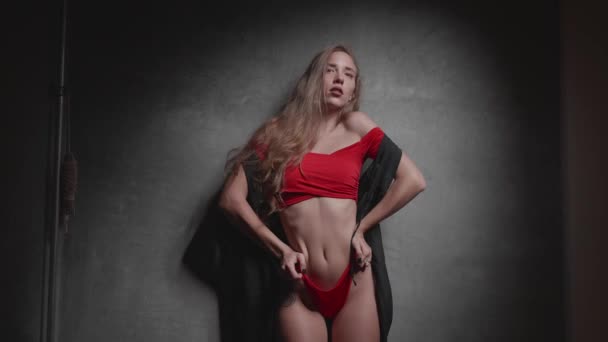Beautiful Young Woman Red Bikini Black Overall Posing Gray Wall — Stock Video