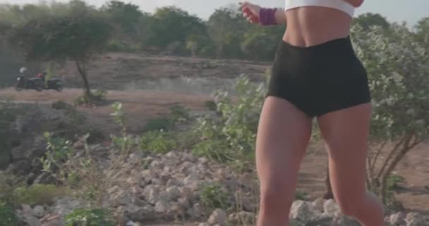 Closeup Body Young Attractive Woman Jogging Sea Shore Cliff Sunrise — Stock Video