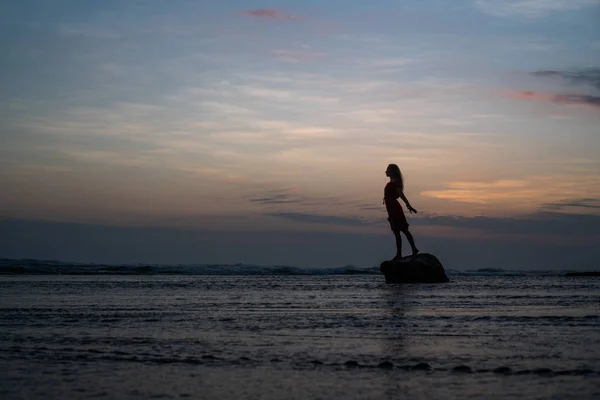 Silhouette Woman Red Dress Posing Small Rock Sea Water Sunset — Stock Photo, Image