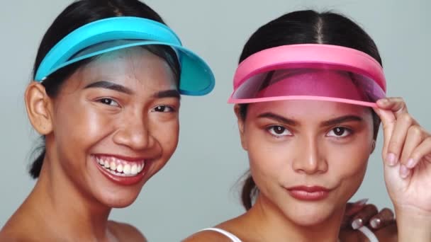 Portrait Two Beautiful Happy Asian Women Sun Visor Cap Smiling — Stock Video