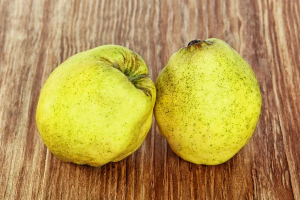 Two Appetizing Ripe Quince Grunge Wooden Background Taken Closeup — Stock Photo, Image