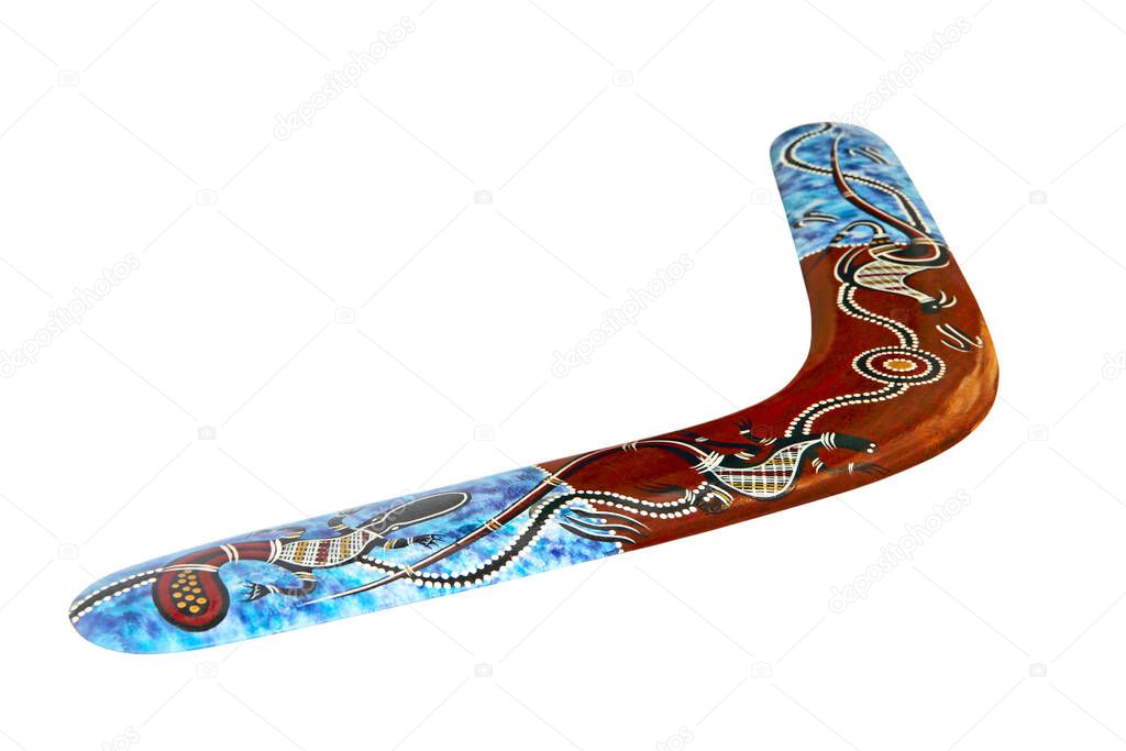 Multicolored australian boomerang isolated on white background taken closeup.