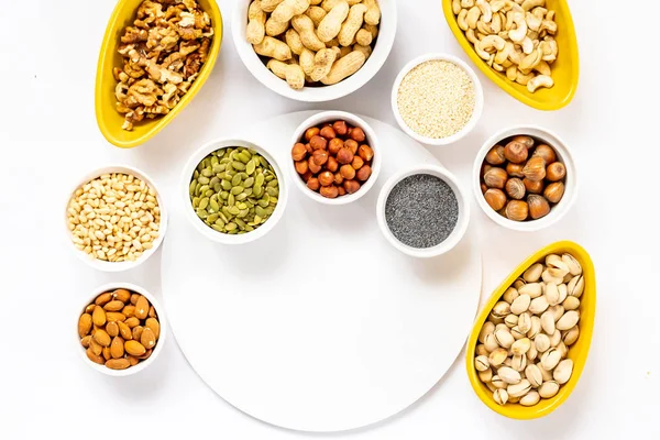 Top View of Variety of Nuts and Seeds on the White Background, F — Stock Photo, Image