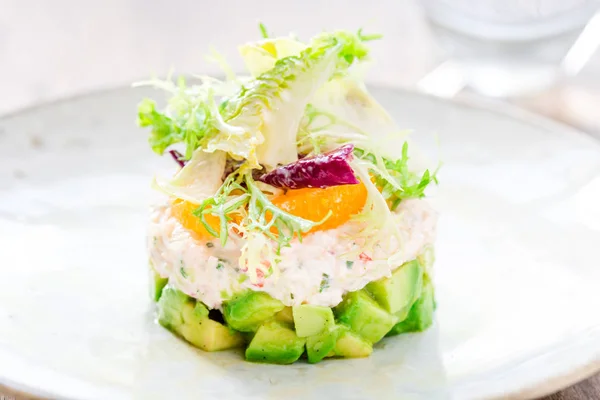 Layer Salad with Shrimps, Crab and Avocado in Luxury Restaurant Royalty Free Stock Images