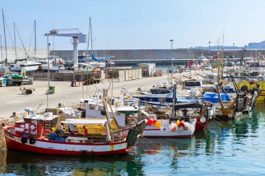 Fishing boats and yachts in port Blanes. Spain clipart