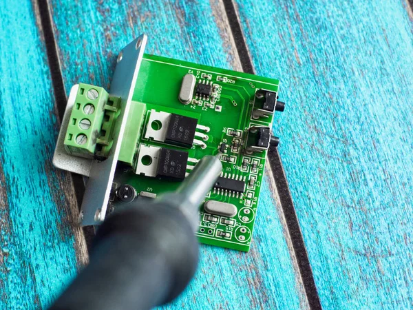 Damaged electronic board during repair with a soldering iron