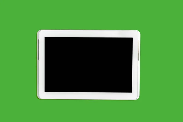 Tableta PC sobre un fondo verde — Foto de Stock