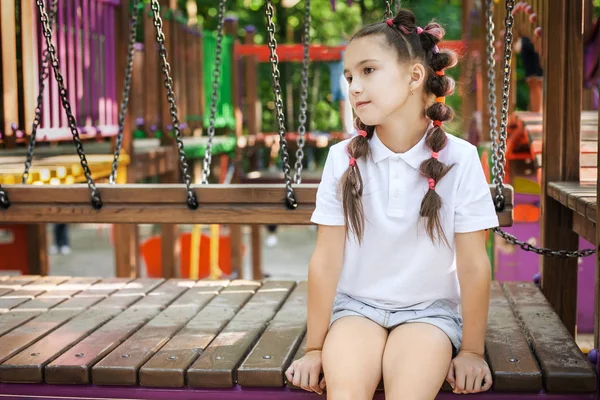 Menina no parque infantil — Fotografia de Stock