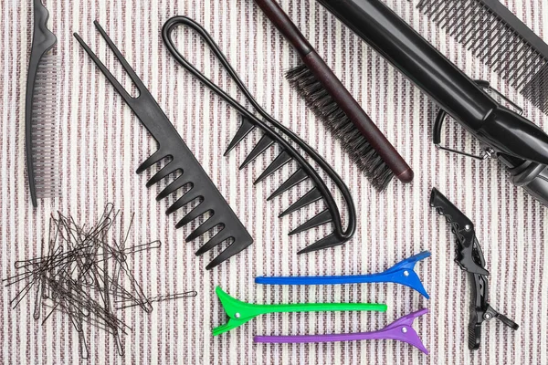 Variety of hairbrushes, bobby pins and hair sticks — Stock Photo, Image