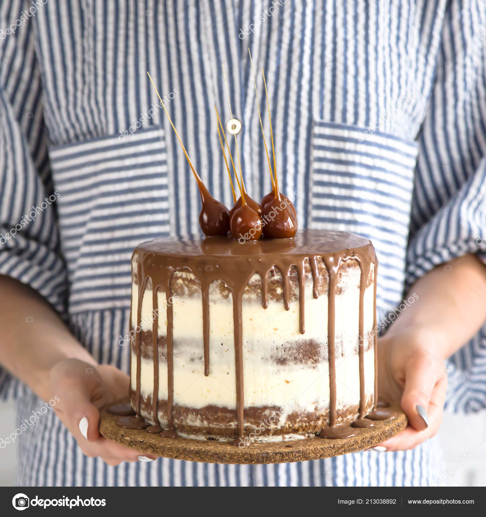 Woman Holding Small Beautiful Cake Filled Chocolate Caramel