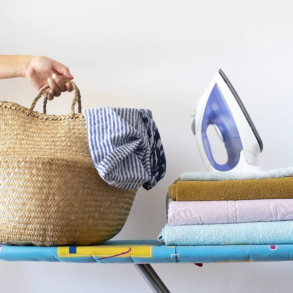 Woman Hand Holds Basket Clean Linen Ironing Ironing Board Next — Stock Photo, Image