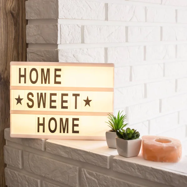 Home Sweet Home Written Decorative Frame Illumination Interior White Brick — Stock Photo, Image