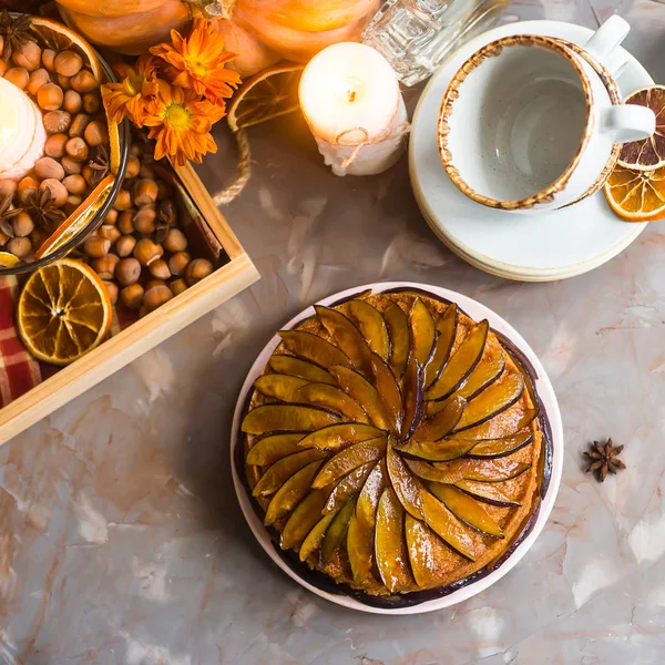 Plum Cake Decorated Sliced Plum Autumn Decor Pumpkin Candle Oranges — Stock Photo, Image