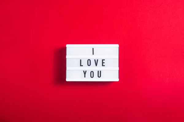 Love You Written Decorative Lamp Bright Red Background Valentine Day — Stock Photo, Image