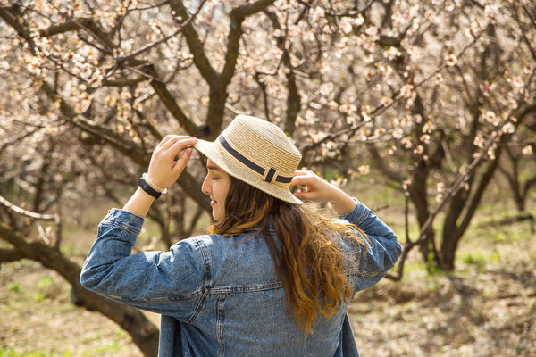 Modern stylish lifestyle and girl in casual clothing and hat in 