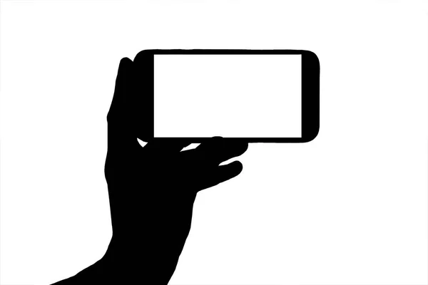 Silueta de la mano con el teléfono sobre fondo blanco dispara vídeo — Foto de Stock