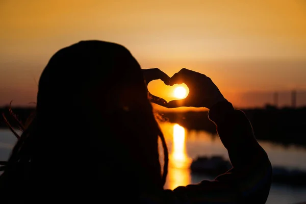Silhouette Girl Hands Forming Heart Shape Sunset Reflection Solar Track — Stock Photo, Image