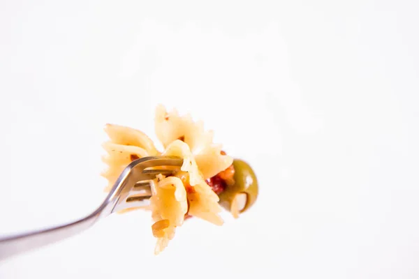 Farfalle Pasta Sun Dried Tomato Ham Olives Fork White Background — Stock Photo, Image