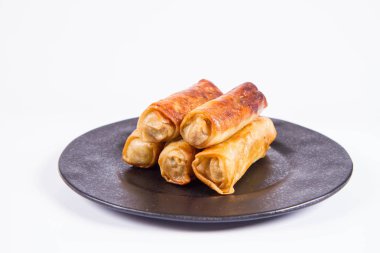 Çince Geleneksel siyah bir plaka üzerinde Çin böreği