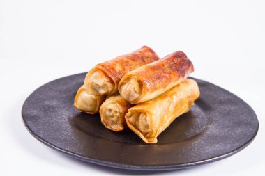 Çince Geleneksel siyah bir plaka üzerinde Çin böreği