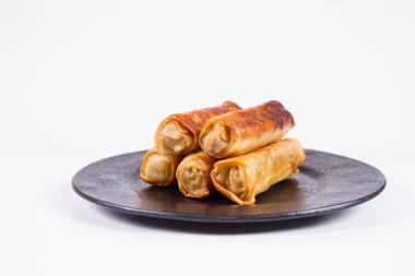 Çince Geleneksel siyah bir plaka üzerinde Çin böreği