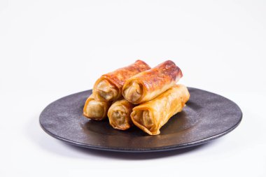 Çince Geleneksel siyah bir plaka üzerinde Çin böreği