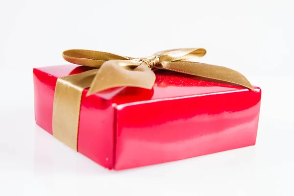 Wrapped Gift Golden Ribbon White Background — Stock Photo, Image