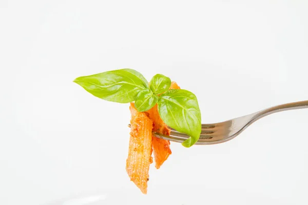 Penne Pesto Rosso Sun Dried Tomatoes Decorated Basil Eaten Fork — Stock Photo, Image